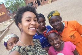 Elena Ruyter '14 with girls in Burkina Faso.